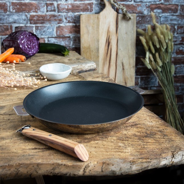 Non-stick stainless steel frying pans, in use